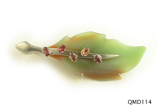 Seth & Reid Falling Leaves: QMD114 Soft Moss Green and Taupe Leaf 2 5/8” x 1” 1.23cttw red wine multi-colored sapphires, 14kt white gold pin/pendant with matte finish