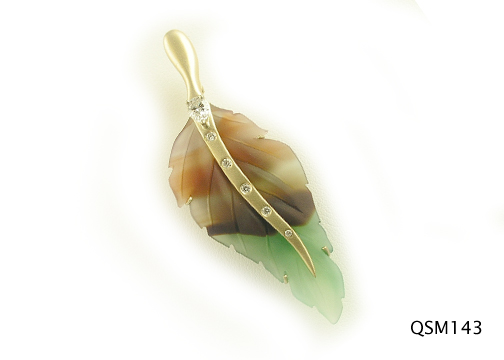 Seth & Reid Falling Leaves: QSM143 Wavy Green and Brown Leaf 2 ½” x 7/8” .42cttw round and pear shaped diamonds burnished and prong set 14kt yellow gold pin with matte finish